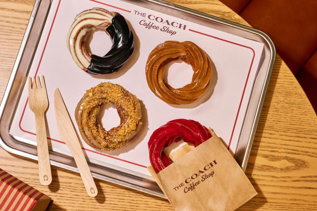 From The Bakery – Crullers (From Top Left Clockwise – Black & White, Maple Glazed, Raspberry Glazed, Apple Crumble)