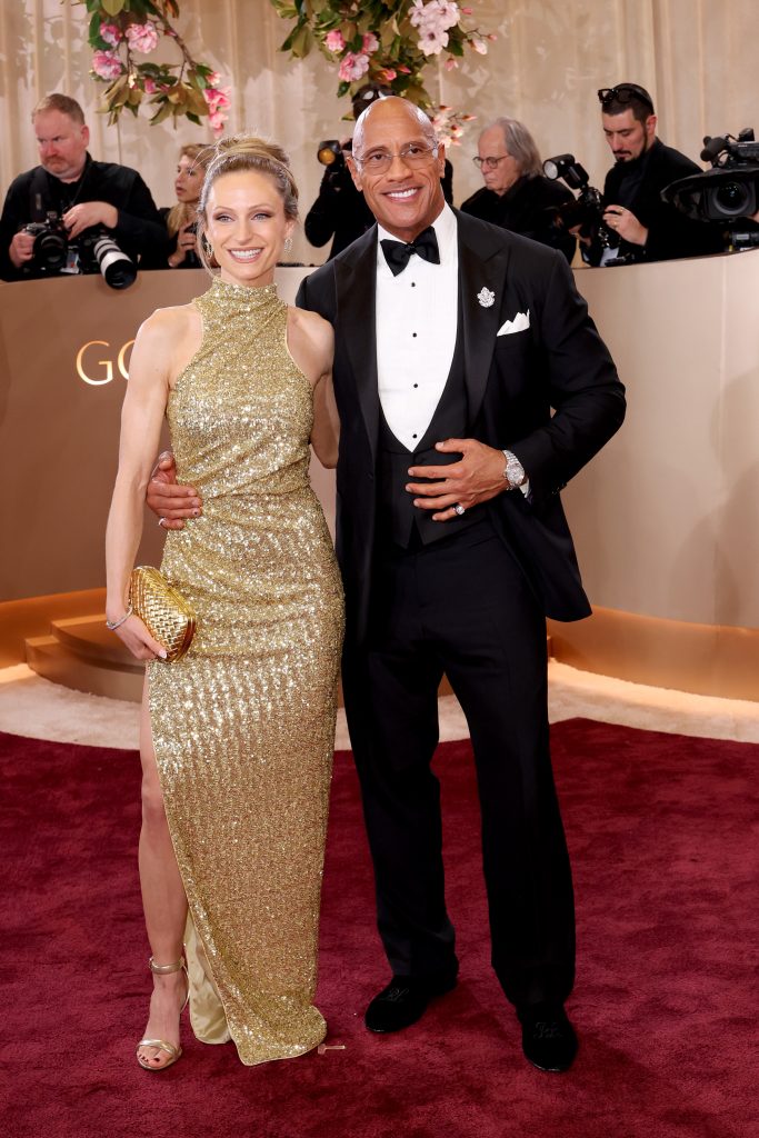 BEVERLY HILLS, CALIFORNIA - JANUARY 11: (FOR EDITORIAL USE ONLY) (L-R) Lauren Hashian and Dwayne Johnson attend the 83rd Annual Golden Globe Awards at The Beverly Hilton on January 11, 2026 in Beverly Hills, California. (Photo by Monica Schipper/Getty Images)