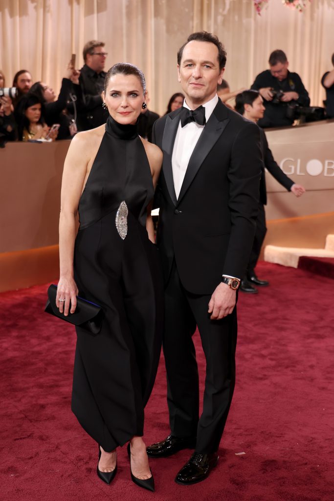 BEVERLY HILLS, CALIFORNIA - JANUARY 11: (FOR EDITORIAL USE ONLY) (L-R) Keri Russell and Matthew Rhys attend the 83rd annual Golden Globe Awards at The Beverly Hilton on January 11, 2026 in Beverly Hills, California. (Photo by Kevin Mazur/Getty Images)