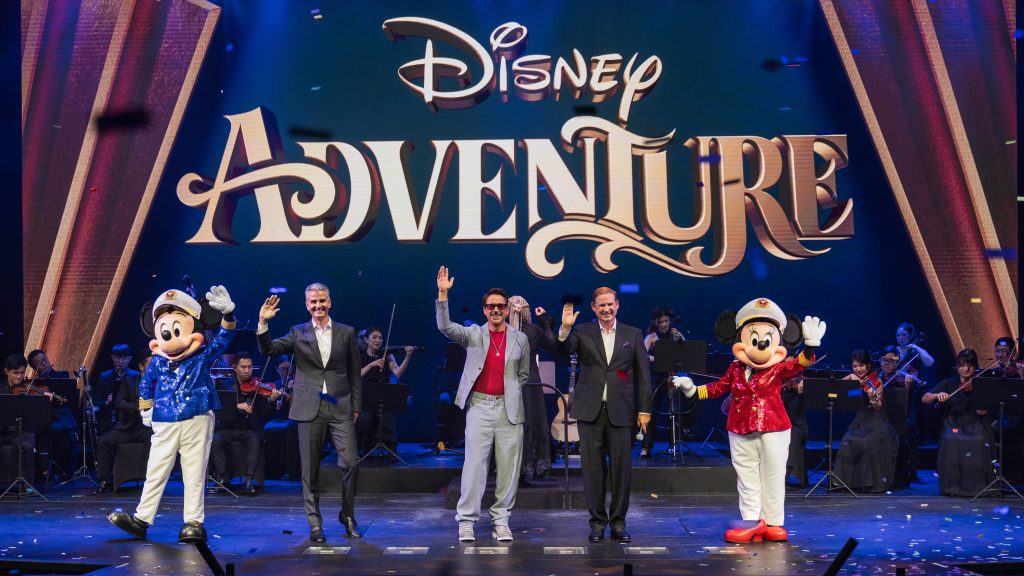 Disney Cruise Line welcomed its newest ship, the Disney Adventure, to its rapidly expanding fleet in a dazzling entertainment showcase that celebrated the beloved Disney stories, characters, and music that come to life onboard. The elegant artistry of the christening ceremony punctuated the introduction of the cruise line’s first ever ship to sail in Southeast Asia. Chairman of Disney Experiences and incoming Chief Executive Officer of The Walt Disney Company, Josh D’Amaro, and President of Disney Signature Experiences, Joe Schott, joined the artists on stage along with Godparent Robert Downey Jr. to mark the momentous occasion. (Steven Diaz, photographer)